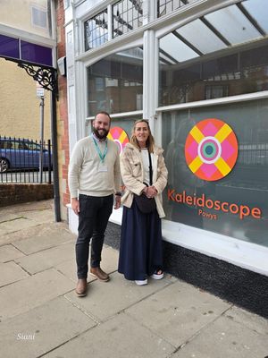 Sam Hembury, Head of Health and Safety Estates and Rondine Molinaro, Chief Executive Officer of Kaleidoscope outside the renovated Llandrindod Wells building