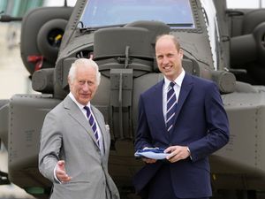 Supporting image for story: King hands military role to William during visit to Hampshire air base