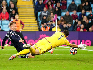 Supporting image for story: Aston Villa's Emi Martinez kicks bread and fizzy to preserve World Cup dream