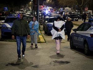 People seek safety in the streets following the earthquake