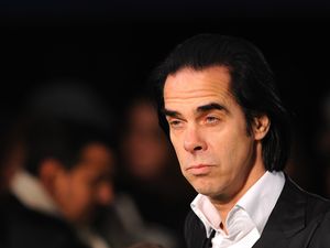 Supporting image for story: Nick Cave: Barry Humphries was offensive on every level – and a hero