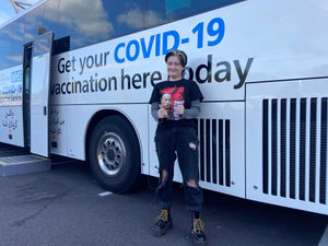 Supporting image for story: Students grab a jab at vaccine bus 