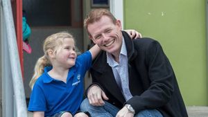 Kevin Carr with Isla Lunn, who he raised money for before he died