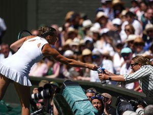 Supporting image for story: Sabalenka gives water to Wimbledon spectators amid sweltering conditions