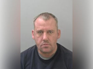 Supporting image for story: Axe-brandishing robber who struck at Oswestry jewellers for just £115 is jailed