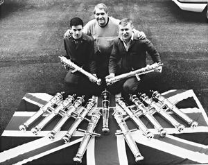 Antique Artillery, Albrighton. The firm completed an order for bronze cannons to be fitted to a large schooner in the Balearic Isles. A. Fryer and Son of Willenhall and Summit Engineering of Wolverhampton are mentioned. The photograph shows Mike Burke (right) and Andy Melia (left) with Jim Bowen (centre). June 7, 1990.