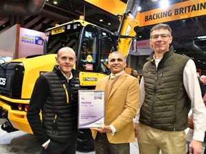 The Silver award for Machine of the Year was presented at the LAMMA show to (from left) Richard Brooks, Chief Innovation Director, Ajay Patil, Group Business Director, and John Smith, JCB Agriculture Managing Director.