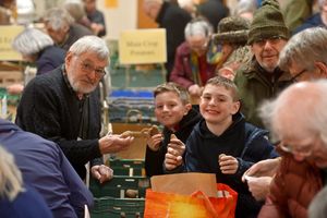 All smiles for Potato Day at Wattlesborough Village Hall, near Shrewsbury. William Edmondson chats to twins: William and Harvey Thomas 9.