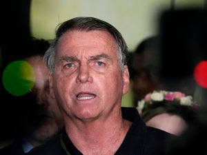 Supporting image for story: Brazil’s Bolsonaro planned and participated in coup plot, police report alleges