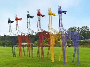 Supporting image for story: It's neck and neck as Shropshire giraffes to spread recycling message