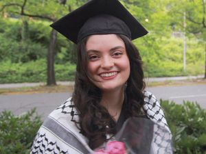 Supporting image for story: Mourners attend funeral for American activist ‘shot dead by Israeli troops’