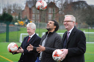 Dudley College principal Lowell Williams joins Goodman and Mr Austin for a game of keepie uppie