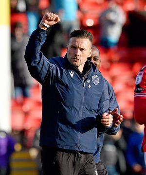 Walsall manager Mat Sadler celebrates at the final whistle.