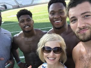 Supporting image for story: This teen's mum won the internet after befriending football players at her daughter's university orientation
