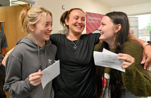 Poppy and Lily Upton celebrate their results with mum Samantha Upton at Shrewsbury Academy