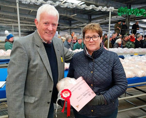 Show judge Alan Tomlinson with Yvonne Andrew from Meifod who won the prize for best chicken.