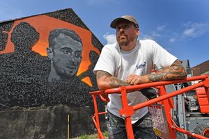 Birmingham artist and Wolves supporter, Joe Miles, said that the community has come together to help with the artwork