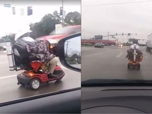 Supporting image for story: Watch the heart-stopping moment an elderly woman drove her mobility scooter onto a busy highway