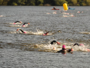 Supporting image for story: Swimmers riding a wave after £8,500 fundraiser