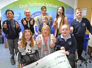 Penn Hall School came first in our Cash for Schools competition, winning £5,000. Pictured is assistant headteacher Sue Bagshaw with students and sponsors.
