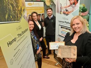 Supporting image for story: MP Unytes with other visitors to see Wolverhampton firm's new training system