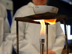 A pupil with a Bunsen burner