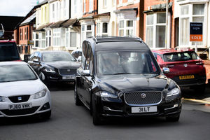 The funeral procession leaves from outside the West End Club to Bushbury Crematorium