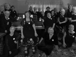 Supporting image for story: WI celebrate 100 years with Calendar Girl style fundraising calendar