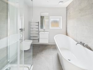 One of the bathroom suites in The Hayloft.