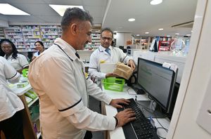 Malkit with technician Nadeen Mohammed.