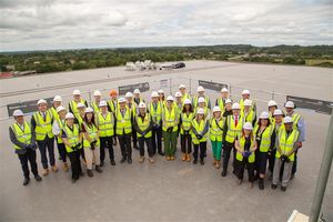 Staff from the New Hospital Programme, Royal Bournemouth Hospital and Darwin Group® celebrate with topping out ceremony.