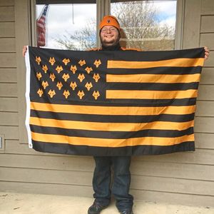 33-year-old Chris Wood, from Columbus in Ohio, with his American Wolves flag