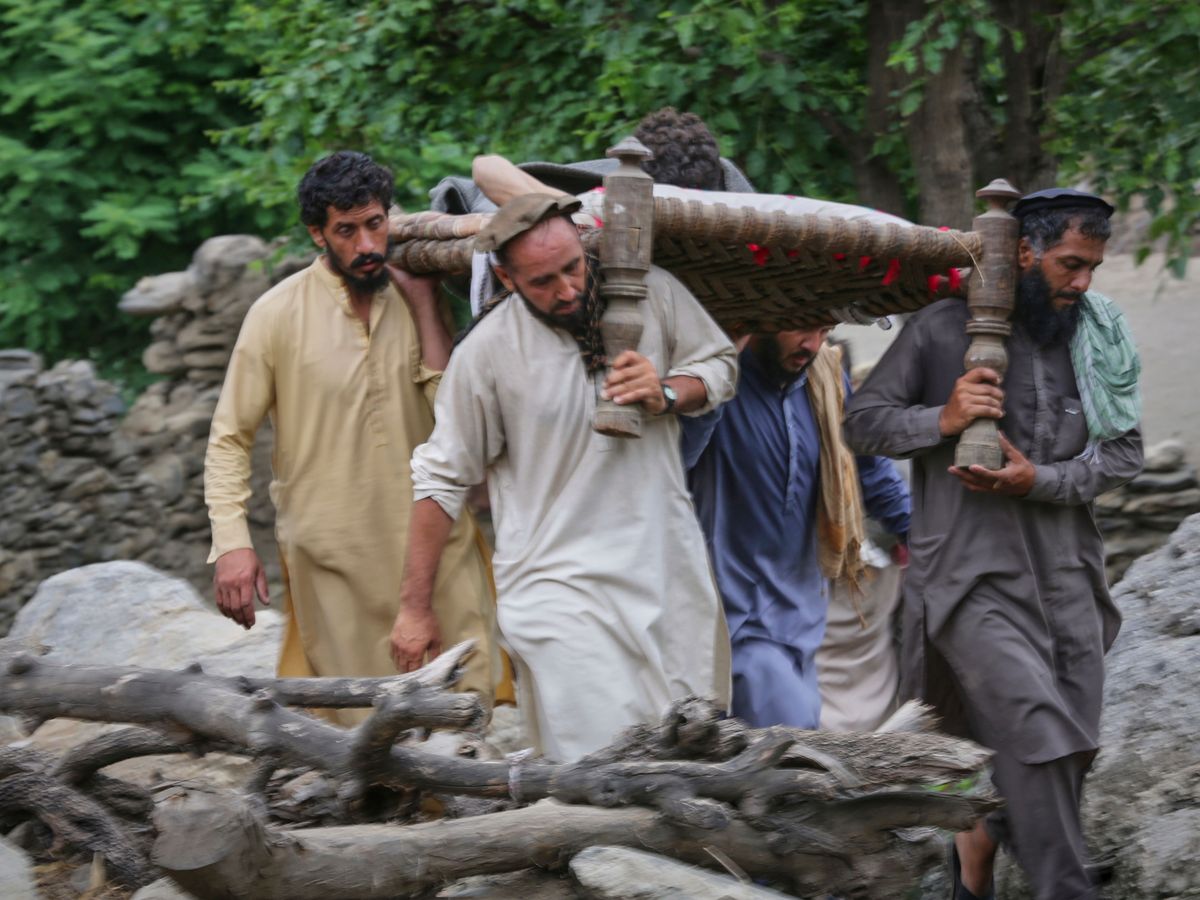 Afghan rescue teams search for quake survivors as death toll rises to 900