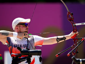 Supporting image for story: Patrick Huston and co. take aim in Tokyo