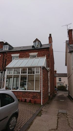 The Labrador had to be rescued after getting stuck on the roof of a home in Telford. Credit: @SFRS_Control