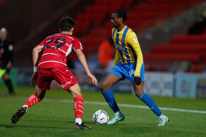 Nathanael Ogbeta of Shrewsbury Town and Lirak Hasani of Doncaster Rovers (AMA)