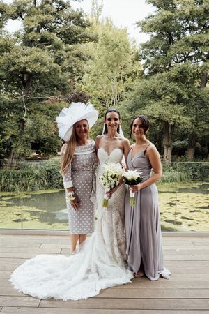 Emily Labhart (centre) on her wedding day in Shropshire, with her mom Joanna and big sister Jessica. 