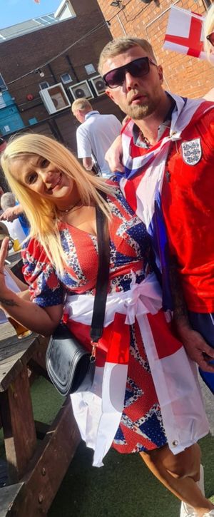 Tanya Ostolski in her patriotic dress with son Leon. A woman who was wearing a Union Jack dress and refused entry to a Wetherspoon's pub said she won't be going back - despite being a regular at the pub for nearly 30 years. Tanya Ostolski, 54, tried to enter The Picture House in Sutton-in-Ashfield, Nottinghamshire, where she was turned away due to her outfit, she claims. The events followed an anti-illegal immigration protest that took place in Nottingham town centre on Friday July 25 which Tanya attended. The protest was sparked after Reform MP Lee Anderson made an unverified claim that a local man charged with rape was an asylum seeker. After marching in the protest, Tanya made her way to the local Wetherspoons establishment but was denied entry due to her dress, despite putting away the flag she was carrying, she says.