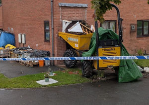 Emergency services, including police officers and firefighters, were at the scene after a dumper truck crashed into a house in Telford