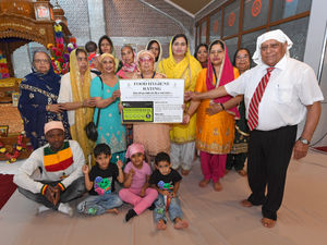 Supporting image for story: Meet the team behind a successful temple in Darlaston celebrating a new success