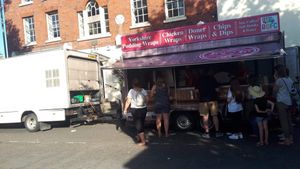 A burger van was set up in front of a cafe which the owner says hit his trade
