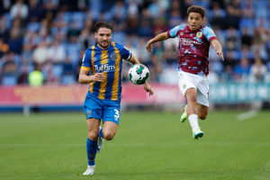 Luke Leahy of Shrewsbury Town and Manuel Benson of Burnley (AMA)