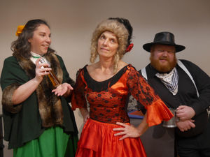 Belle played by Fiona Collins in the centre with Connie and Billy the Skid. Image: Andy Compton