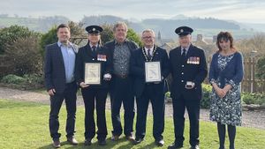 Bryan Davies and Katrina Davies were recognised for more than 60 years of combined service at Talgarth Fire Station.