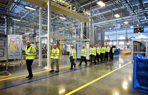 Pensioners from Cannock Chase Probus Club are given a guided tour by staff member Gareth Slater