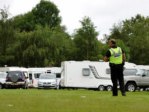 Supporting image for story: 100-caravan convoy moves onto play area after travellers booted from nearby site