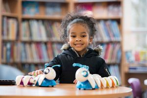 Isaac Choi, 5, plays with the Code-a-pillars at Penn Library
