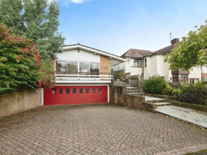 Supporting image for story: Inside three-bedroom Sandwell bungalow sitting on top of a garage complete with outdoor pool - Here's how much it will set you back
