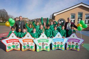 Pupils and staff at Long Knowle Primary School celebrating the Ofsted inspection outcome