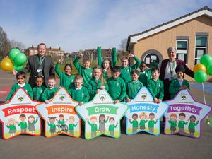 Pupils and staff at Long Knowle Primary School celebrating the Ofsted inspection outcome